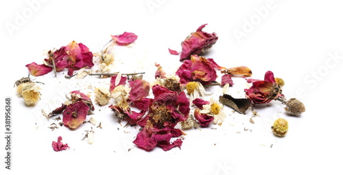 Принти на полотні Dry red rose and chamomile petals isolated on white background