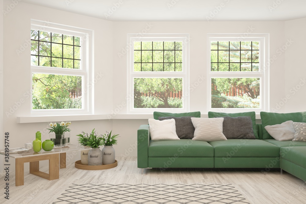 Fototapeta premium White living room with sofa and summer landscape in window. Scandinavian interior design. 3D illustration