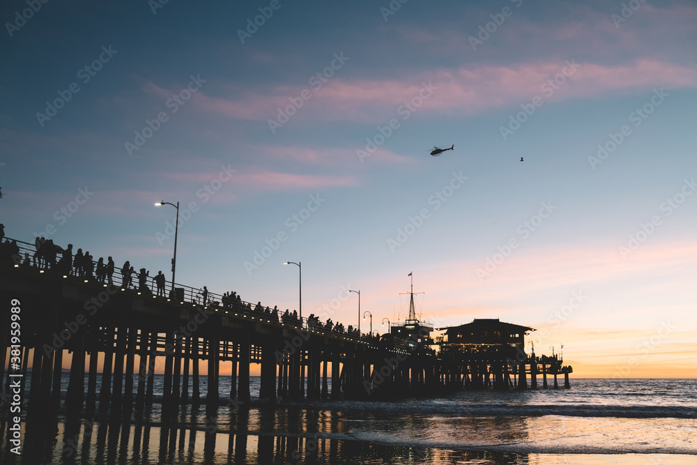 Crowded pier at dawn in early morning