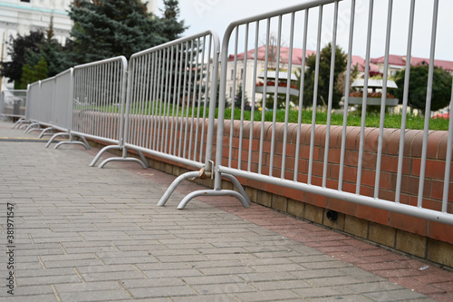 a row of metal barriers