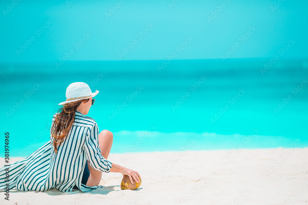 Obraz premium Young beautiful woman on beach vacation on Caribs