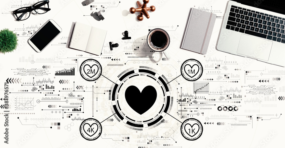 Obraz premium Get more likes concept with a laptop computer on a desk