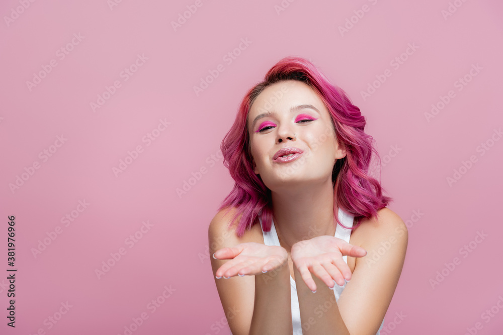 young woman with colorful hair blowing kiss isolated on pink young woman with colorful hair blowing kiss isolated on pink