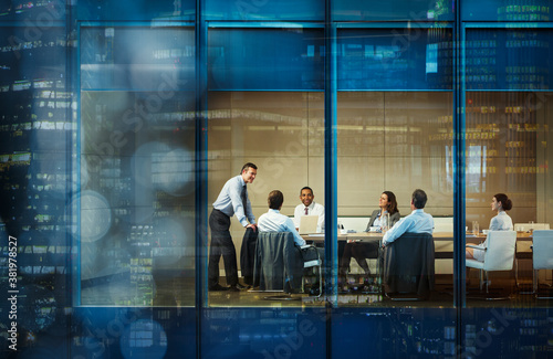 Corporate business people meeting in highrise conference room