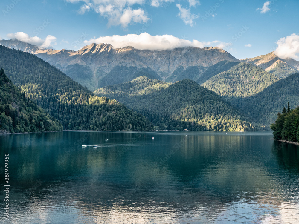Lake Ritsa at Caucasus mountains background. Famous place in Abkhazia