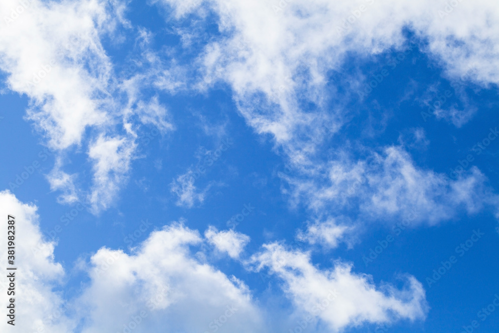 White altocumulus clouds in blue sky at daytime White altocumulus clouds in blue sky at daytime