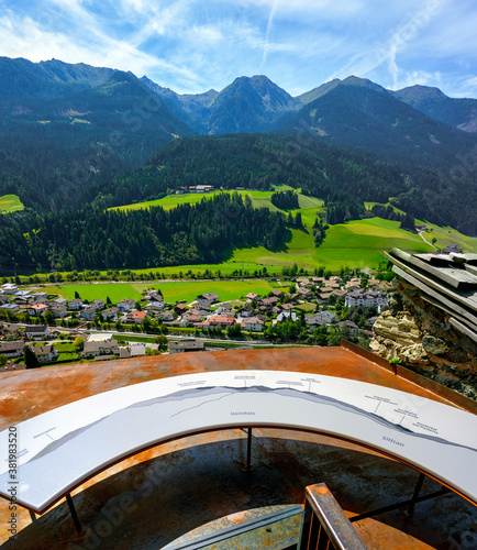 View from the castle onto the village of Heinfels and the carnic alps photo