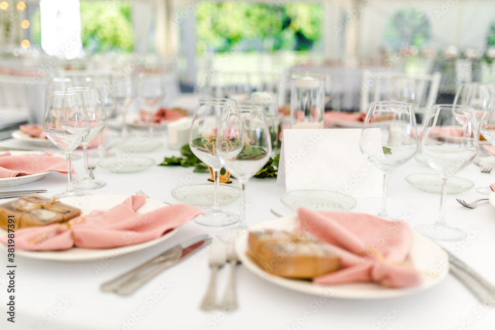 Luxury wedding table decoration in pink and white. Special event table set up. Fresh flower decoration. Luxury wedding table decoration in pink and white. Special event table set up. Fresh flower decoration.