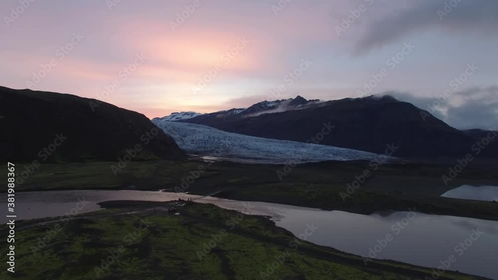 sunset over the glacial lake