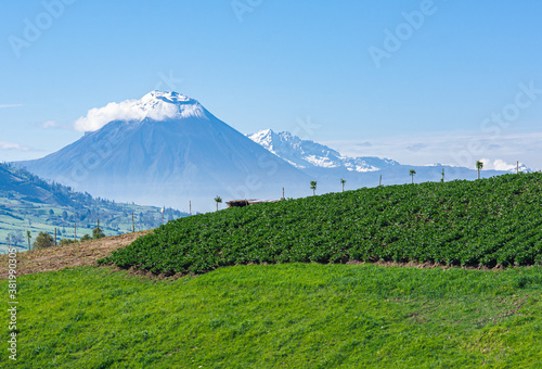 tungurahua volcano with snow in the crater photo