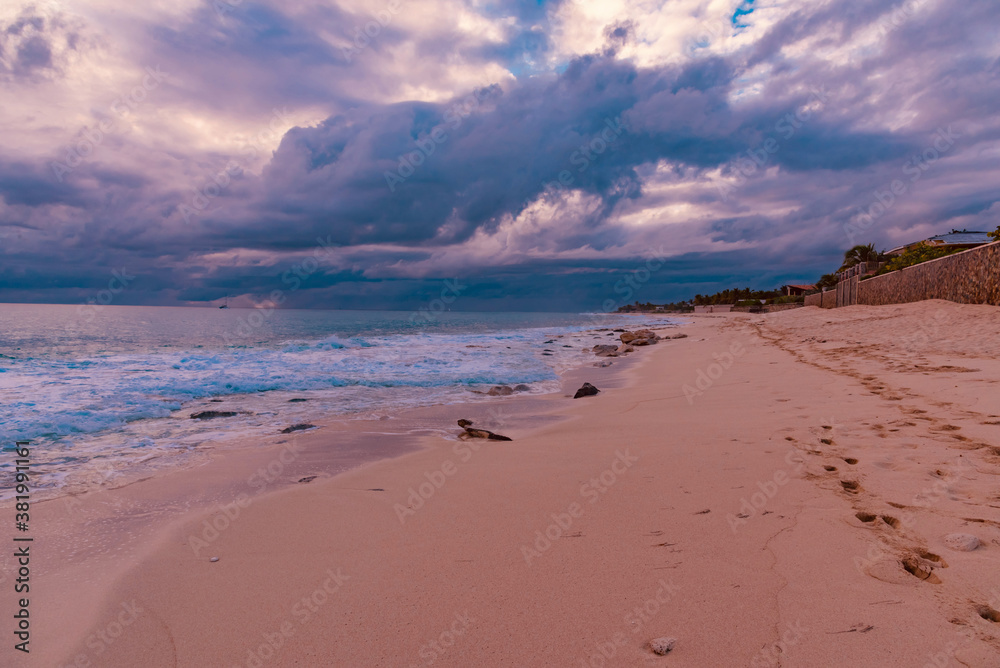 Saint Maarten, Caribbean - January 18 2020:
Caribbean beach of Saint Maarten island at sunset Saint Maarten, Caribbean - January 18 2020:
Caribbean beach of Saint Maarten island at sunset