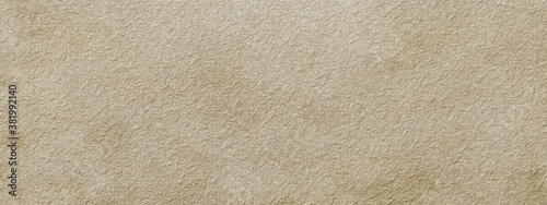 Abstract stone wall, background - in the form of a rough embossed stone surface, closeup