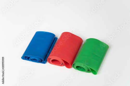 Light (Blue), Medium (Green) and Heavy (Red) Weight Tension Bands, for Fitness Training in Gym.