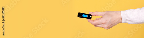 Fényképezés Black usb flash drive in hand, copy space template, banner.