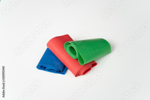 Light (Blue), Medium (Green) and Heavy (Red) Weight Tension Bands, for Fitness Training in Gym.