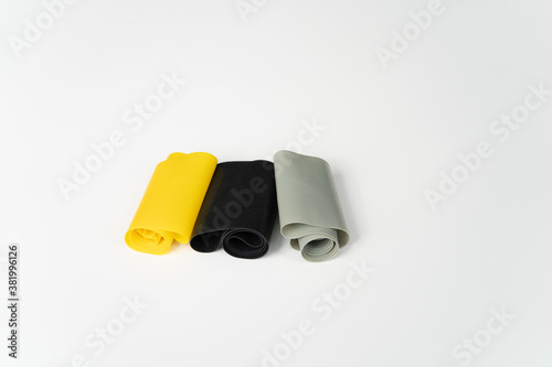 Black, Grey and Yellow Weight Bands, for Fitness Training in Gym.