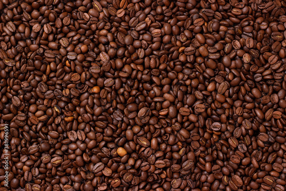 Grains coffee. Background from coffee beans. Roasted coffee beans. Brown coffee beans in whole background. Grains coffee. Background from coffee beans. Roasted coffee beans. Brown coffee beans in whole background.
