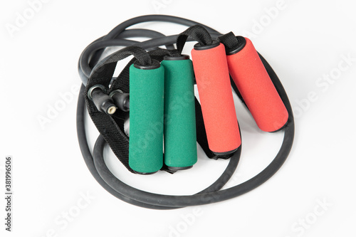 Medium and Heavy Weight Tension Bands, Green and Red, for Fitness Training in Gym.
