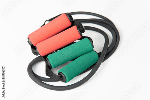 Medium and Heavy Weight Tension Bands, Green and Red, for Fitness Training in Gym.