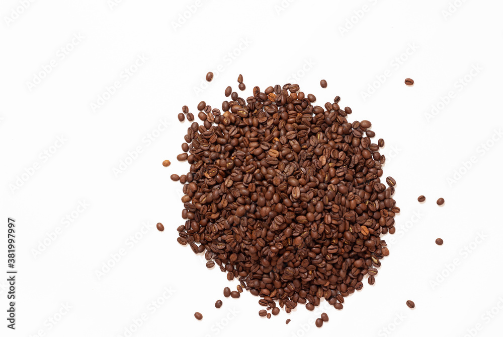 Pile of coffee beans. Heap of roasted coffee beans on white background. Pile of coffee beans. Heap of roasted coffee beans on white background.