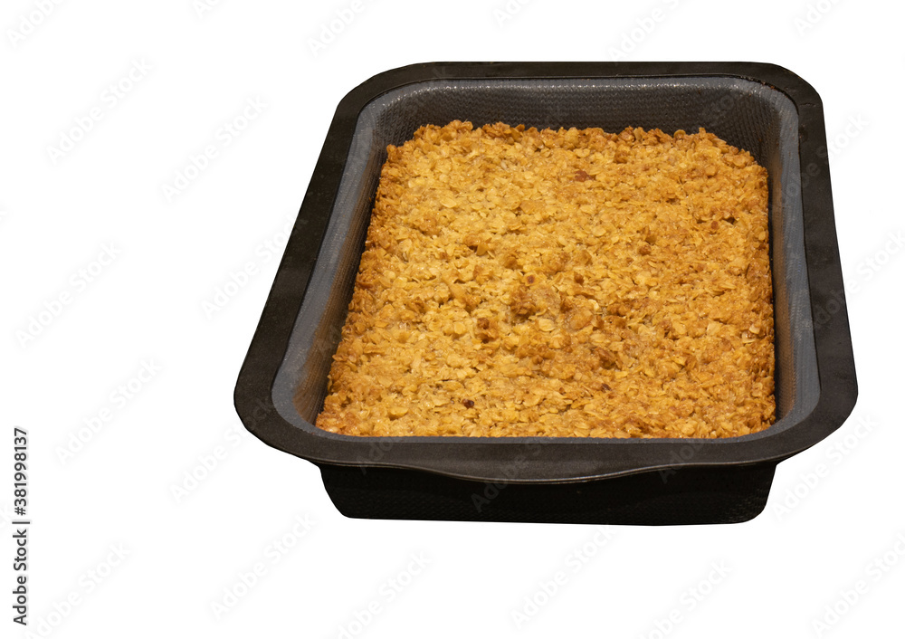 Golden brown flapjack cooked in a silicon container Golden brown flapjack cooked in a silicon container