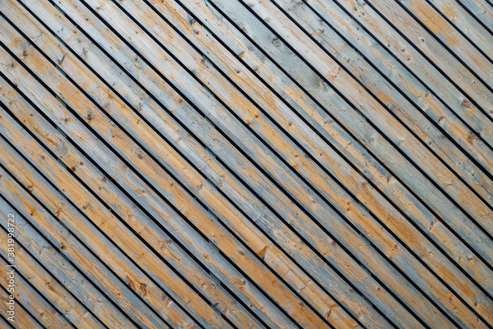 Diagonal texture of natural wood slats, background. Diagonal texture of natural wood slats, background.