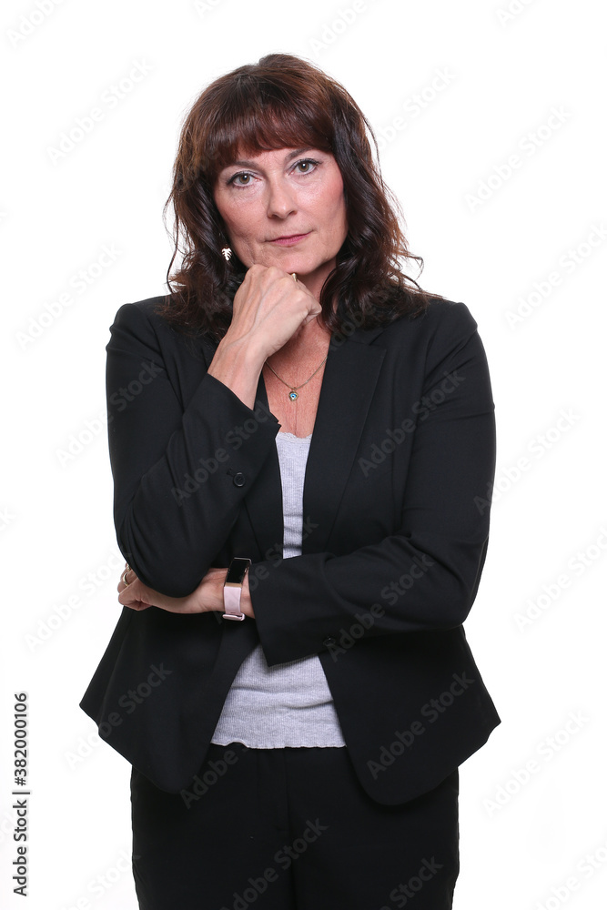 Beautiful mature woman in front of a background Beautiful mature woman in front of a background