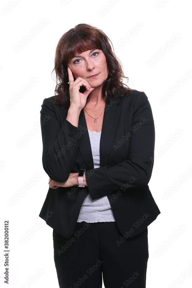 Beautiful mature woman in front of a background Beautiful mature woman in front of a background
