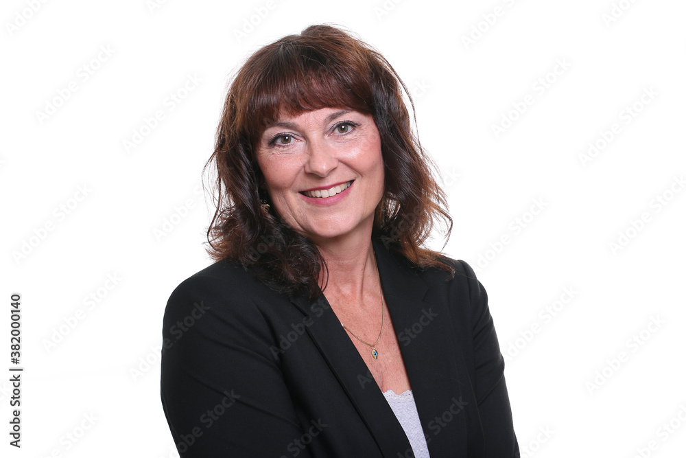 Beautiful mature woman in front of a background Beautiful mature woman in front of a background