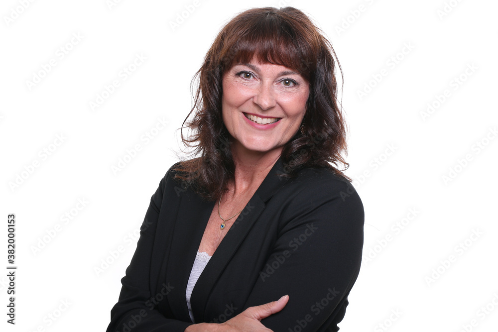 Beautiful mature woman in front of a background Beautiful mature woman in front of a background