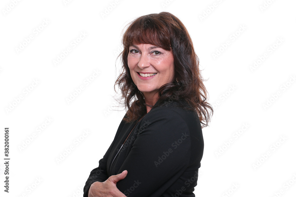 Beautiful mature woman in front of a background Beautiful mature woman in front of a background