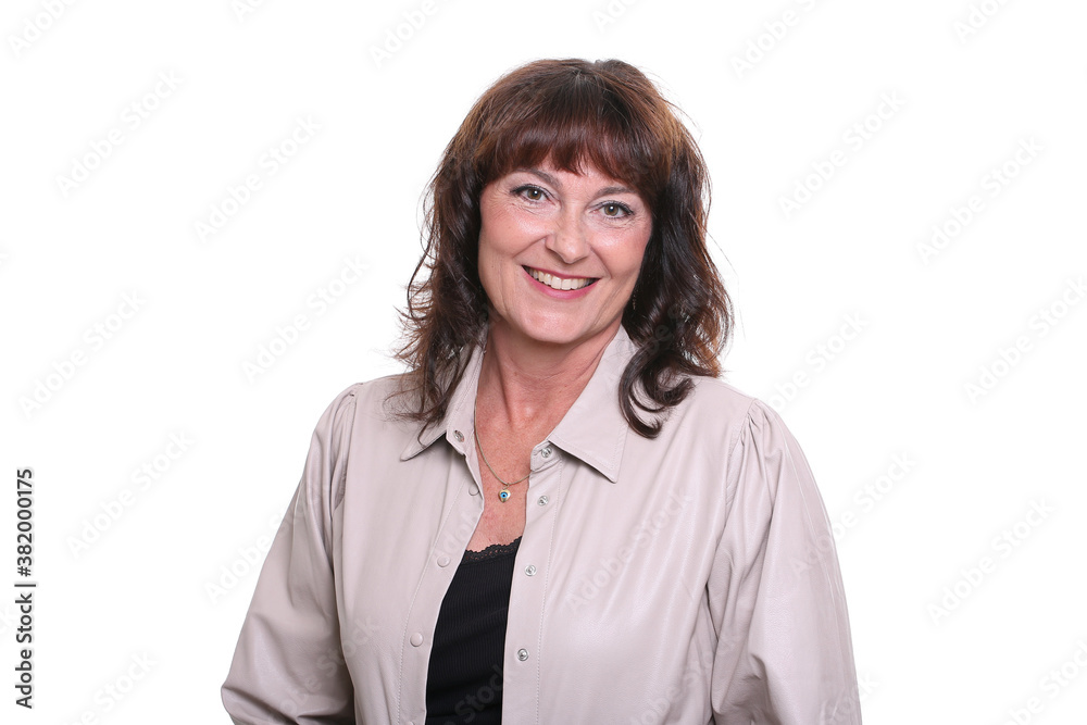 Beautiful mature woman in front of a background Beautiful mature woman in front of a background