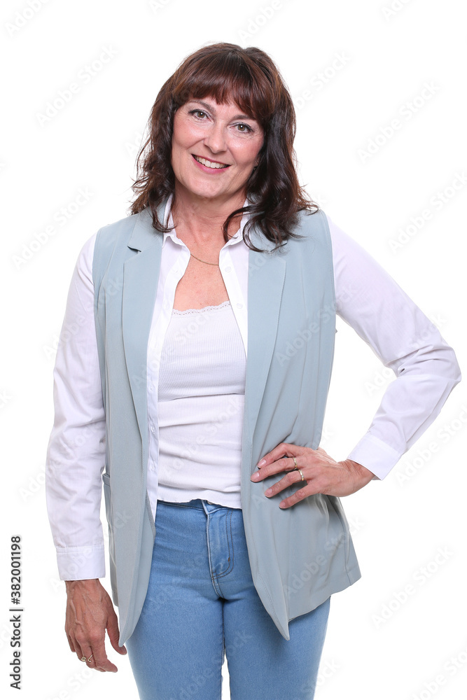 Beautiful mature woman in front of a background Beautiful mature woman in front of a background