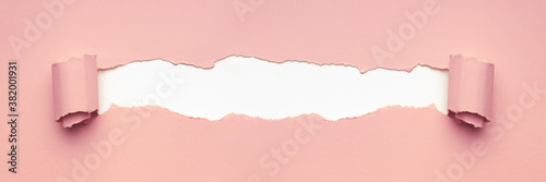 Fotografie Pink torn paper for text or mockup. Minimal creative concept.