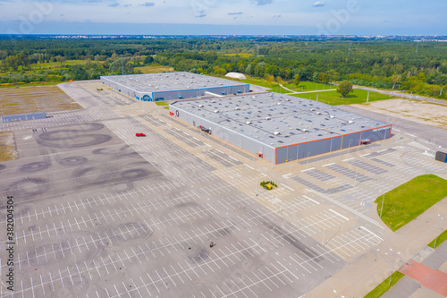 Aerial view of empty shopping mall parking lot due to the coronavirus quarantine