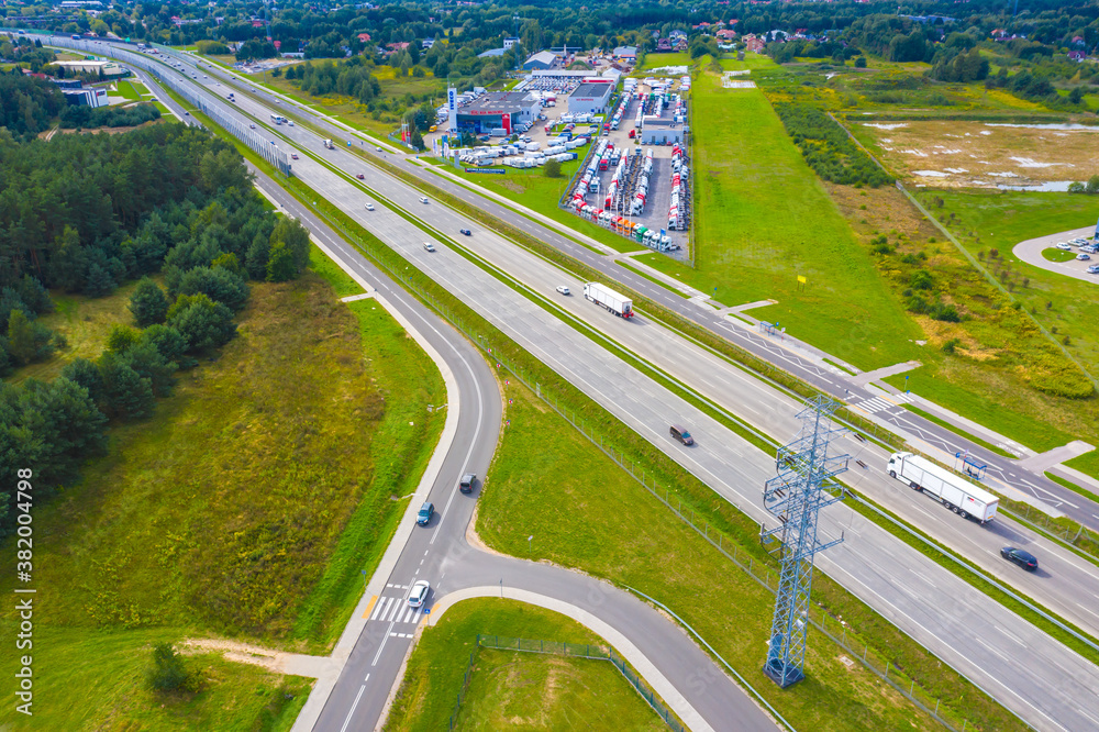 Aerial top view of highway automobile traffic of many cars, transportation concept Aerial top view of highway automobile traffic of many cars, transportation concept