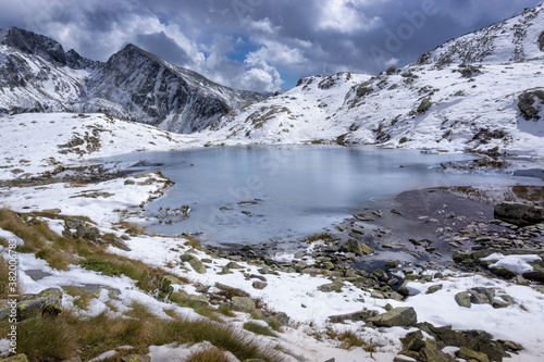Caldirolo Lake in Sambuzza Valley, whitened by the early snowfall of this early autumn - Orobie - Italian Alps.