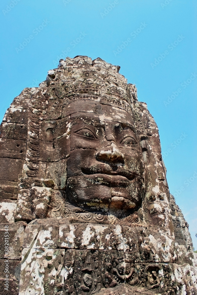 A huge stone face in the Bayon temple of the Angkor complex