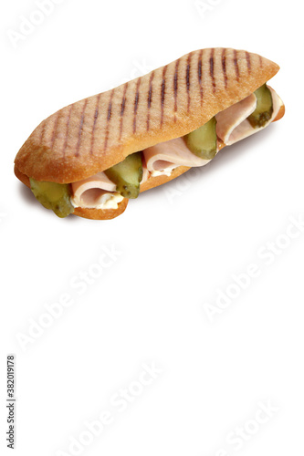 grilled sandwich with ham and cucumber, isolated