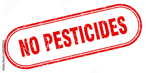 no pesticides stamp. rounded grunge textured sign. Label
