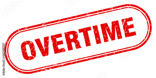 overtime stamp. rounded grunge textured sign. Label