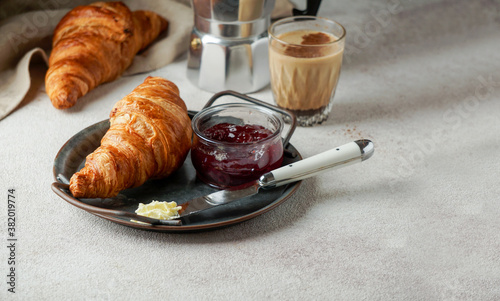 croissants with coffee and jam, tipical cotinental breakfast