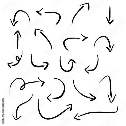 Vector set of hand drawn arrows pointing in different directions on white background