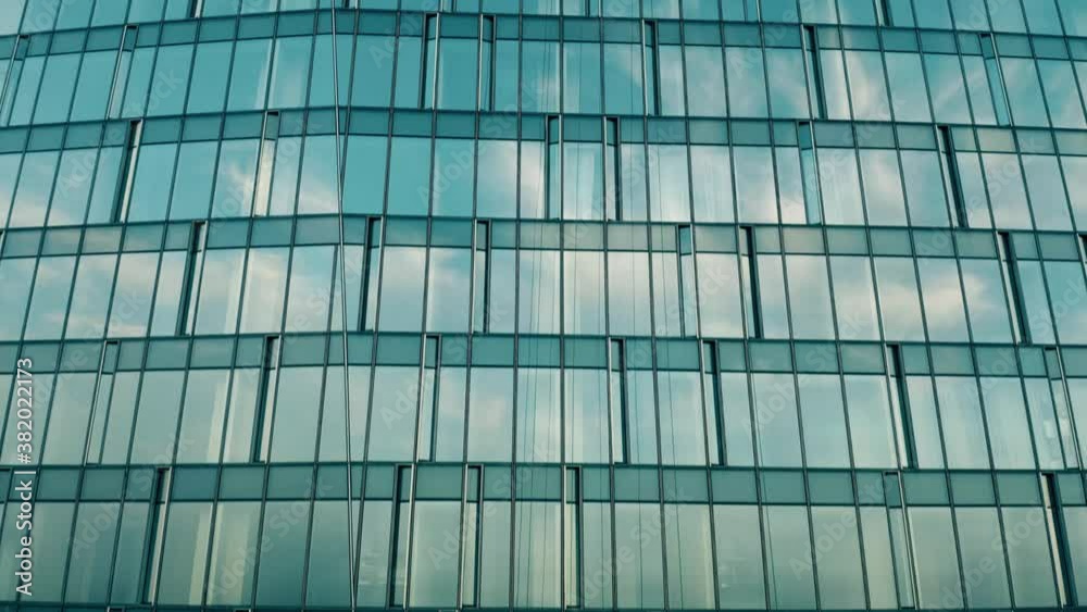 Aerial view of windows of a residential skyscraper reflecting cityscape of Moscow, Russia Aerial view of windows of a residential skyscraper reflecting cityscape of Moscow, Russia