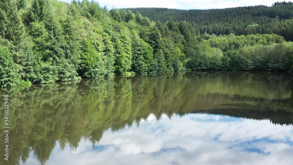 a beautiful natural lake in the forest filmed in 4k a beautiful natural lake in the forest filmed in 4k