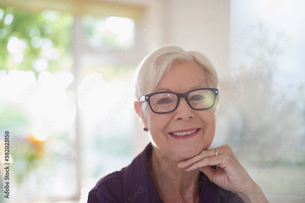 Portrait happy confident senior woman in eyeglasses Portrait happy confident senior woman in eyeglasses