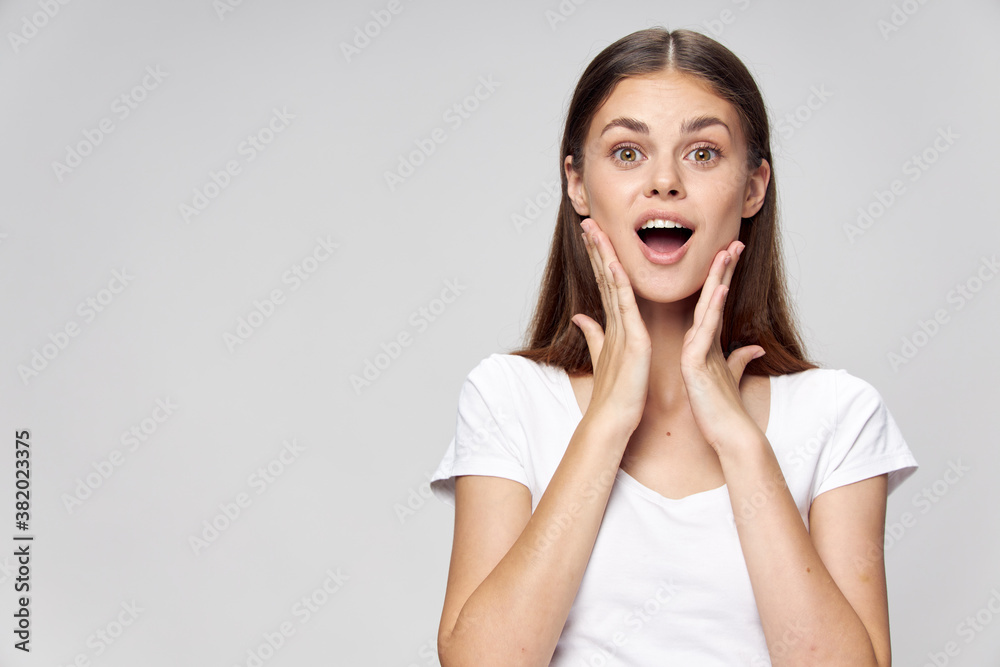 woman with open mouth surprised look white t-shirt woman with open mouth surprised look white t-shirt