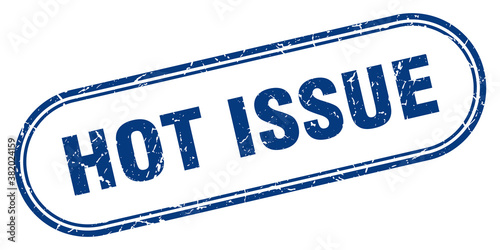 hot issue stamp. rounded grunge textured sign. Label