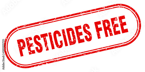 pesticides free stamp. rounded grunge textured sign. Label