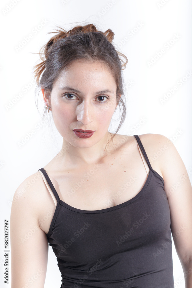 A young woman portrait with red lips in studio A young woman portrait with red lips in studio